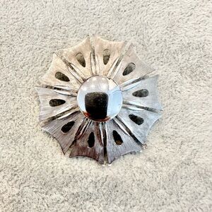 Vintage Art Deco Signed R.N.K Silver Tone Starburst Pin Wheel Brooch Pin.